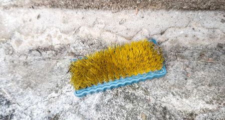 cleaning brush on a floor