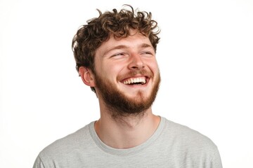 Obraz premium Radiant Joy: Portrait of a Man's Genuine Laughter, A captivating portrait of a smiling man, filled with unbridled happiness and genuine amusement, showcasing the infectious power of laughter.