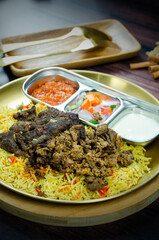 Nasi Kebuli, Indonesian variation of pilaf with Arabic rice influence, cook with goat, lamb or chicken, Spiced  with Clove, Cinnamon and garlic.