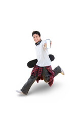 Young man jumps high, holding phone with skateboard on png background