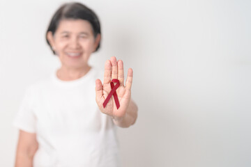 Elderly with Burgundy Ribbon for March Multiple Myeloma Cancer Awareness month, September Sickle Cell Anemia, Headache and Migraine week, April world Meningitis day, October Hospice  Palliative care