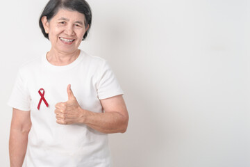 Elderly with Burgundy Ribbon for March Multiple Myeloma Cancer Awareness month, September Sickle Cell Anemia, Headache and Migraine week, April world Meningitis day, October Hospice  Palliative care
