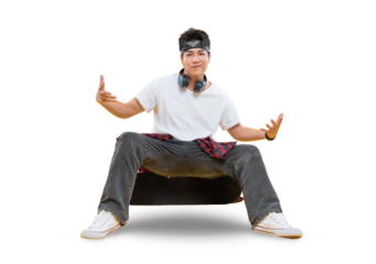 A young man is sitting with skateboard in front of you and looking directly at the camera, he has a headscarf and a headset around his neck. He's dressed in a relaxed style on png background