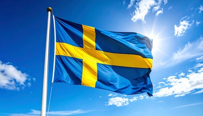 A blue flag with a yellow cross flies on a sunny day