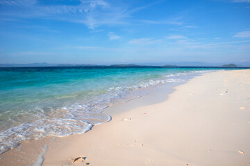 Tropical Beach with Turquoise Water and White Sand