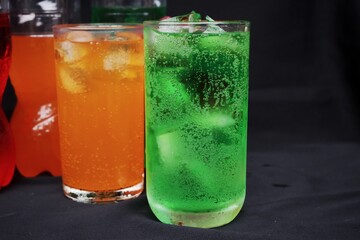 Soft drink with ice in glass
