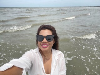 Happy woman at tropical beach