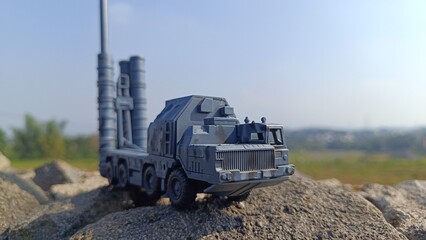 Military Missile Launcher Toy Model on Rocky Terrain