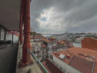 Romantic backstreet, side street or alley in historic old town of Porto Oporto, Portugal with colonial colorful tile style architecture facades, a landmark sightseeing tourist spot in old town