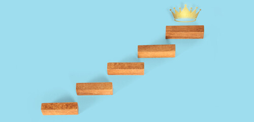 Wooden blocks in shape of a staircase as step Business Concepts, and Success in Finance, Banking and Investment
