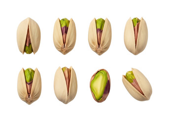 Fototapeta premium Six pistachios with open shells showing green kernels on food snack