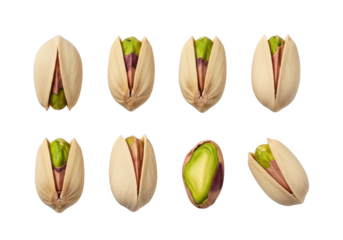 Six pistachios with open shells showing green kernels on food snack