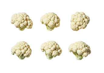 Fototapeta premium Six white cauliflower florets arranged in two rows on vegetable food