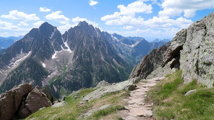 Fototapeta premium Mountain trail winds through alpine peaks