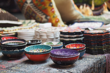 Colorful handmade bowls at a craft market