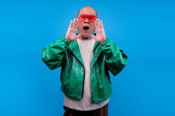 Excited Senior Asian Man Wear Unique Glasses Yelling Or Calling Out
