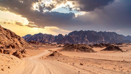 Naklejka premium Desert road, dramatic sunset