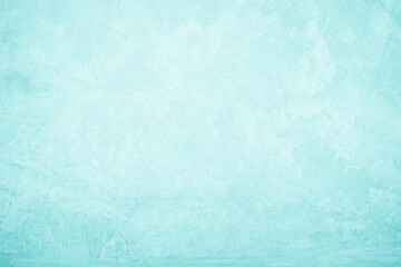 Pastel blue and white concrete stone texture for background in summer wallpaper. Cement and sand wall of tone vintage. Concrete abstract wall of light cyan color, cement texture mint green for design.