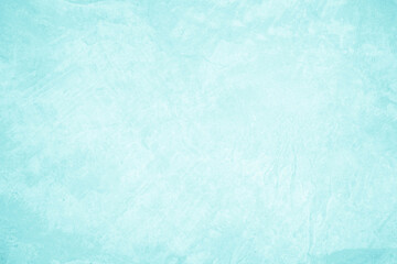 Pastel blue and white concrete stone texture for background in summer wallpaper. Cement and sand wall of tone vintage. Concrete abstract wall of light cyan color, cement texture mint green for design.