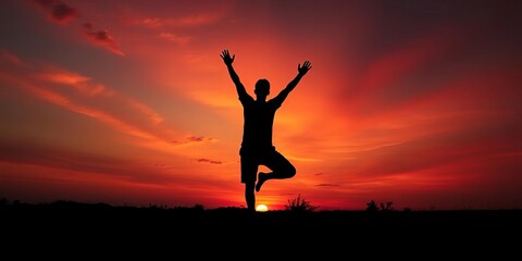 Silhouetted figure in perfect handstand against vibrant sunset,  wellbeing,  athletic