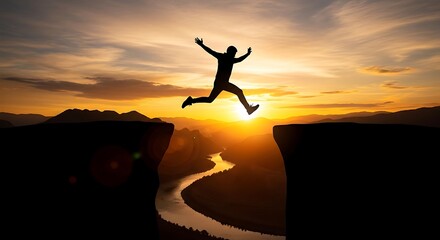 Man jumping across canyon at sunset leaping crossing