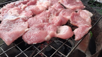 Pork grilled on a charcoal grill