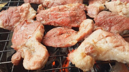 Pork grilled on a charcoal grill