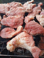 Pork grilled on a charcoal grill