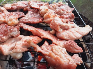Pork grilled on a charcoal grill