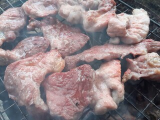 Pork grilled on a charcoal grill