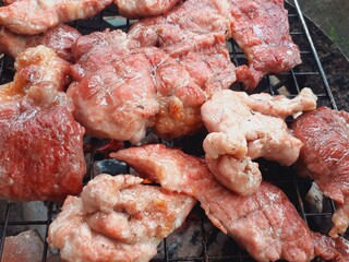 Pork grilled on a charcoal grill