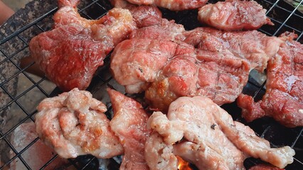 Pork grilled on a charcoal grill