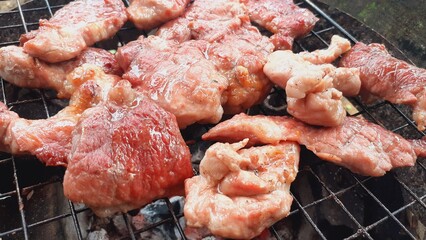 Pork grilled on a charcoal grill