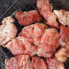 Pork grilled on a charcoal grill