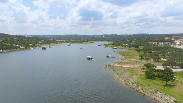 Scenic Aerial of Lake Travis with Speedboat and Summer Tubing