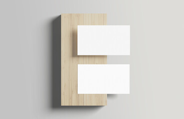 Business card mockup on a wooden background
