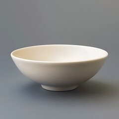 Simple ceramic bowl on a neutral background
