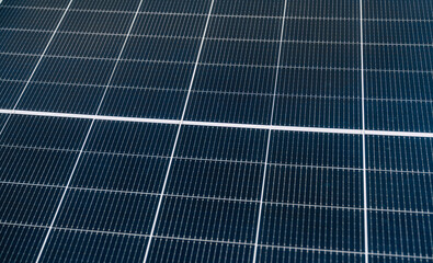 Solar panels installed on a rooftop generate renewable energy during sunny afternoon hours