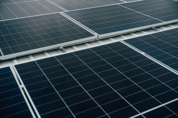 Solar panels installed on a rooftop demonstrating renewable energy solutions in urban settings...