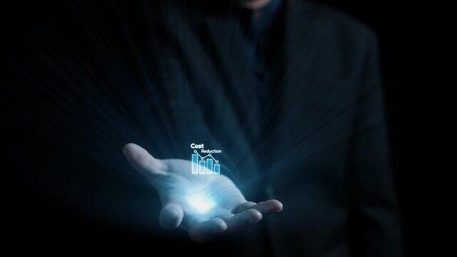 A businessman showcases a digital visualization of cost reduction strategies, featuring graphs and icons that symbolize analytics, finance, and efficiency improvement ideas. Qubit