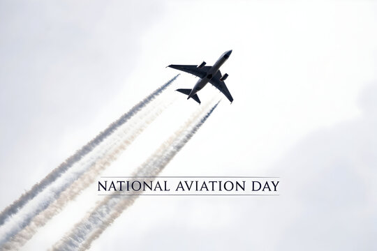 Soaring to New Heights: An airplane gracefully ascends against a hazy sky, leaving a striking contrail. Celebrating the majesty of flight, the image invokes a sense of freedom and adventure.