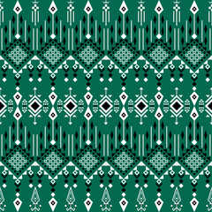 A seamless geometric pattern with diamonds, arrows, and intricate shapes in black, white, and green tones, creating a visually striking tribal-inspired design.
