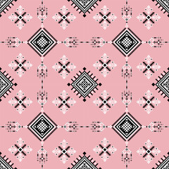 A seamless geometric pattern featuring intricate black and white diamond shapes on a pink background, creating a modern, tribal-inspired design.