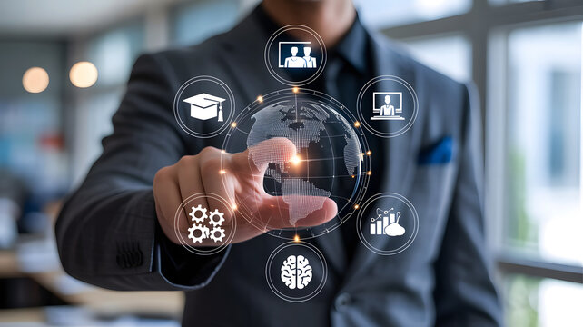 Businessman interacting with a futuristic holographic global network of digital icons representing education and business growth