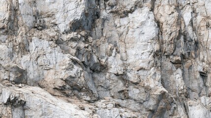 Magnificent rock formations display a variety of textures and colors, formed over time by natural processes. This rugged landscape captivates with its intricate details under bright daylight.