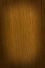 Naklejka premium wooden background, board surface, natural light wood pattern, alder, vignetting, frame with a place for text or object, vertical