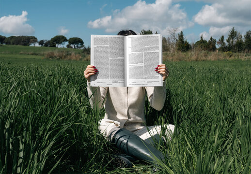 Mockup Of Woman Holding Customizable A4 Magazine Open