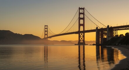 Obraz premium Golden sunrise over suspension bridge