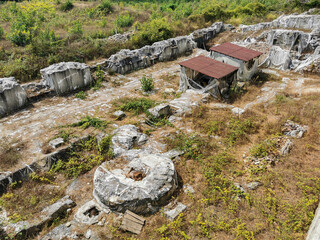 Abandoned Ancient Ruins with Overgrown Vegetation and Stone Structures