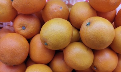 Glow Fresh Orange Fruit on a Basket in tthe store